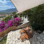 Vakantiehuis Tranquility House Astros *